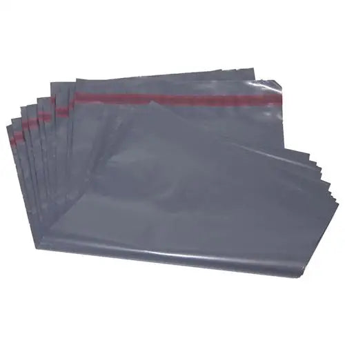 Stack of Recycled Grey Polythene Mailing Postal Bags with Red Adhesive Strips