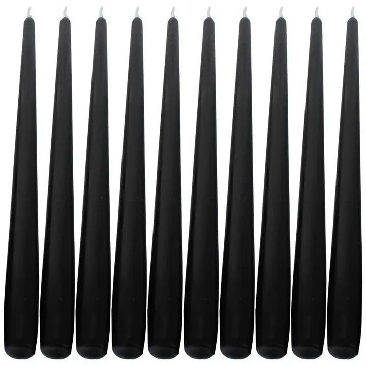 Row of tall black taper candles for elegant dinner settings and ambiance