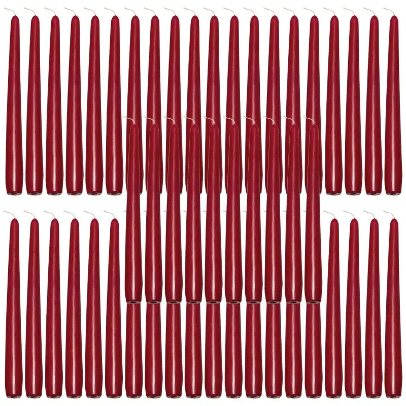 Red taper candles in rows for elegant dinner lighting and ambiance enhancement