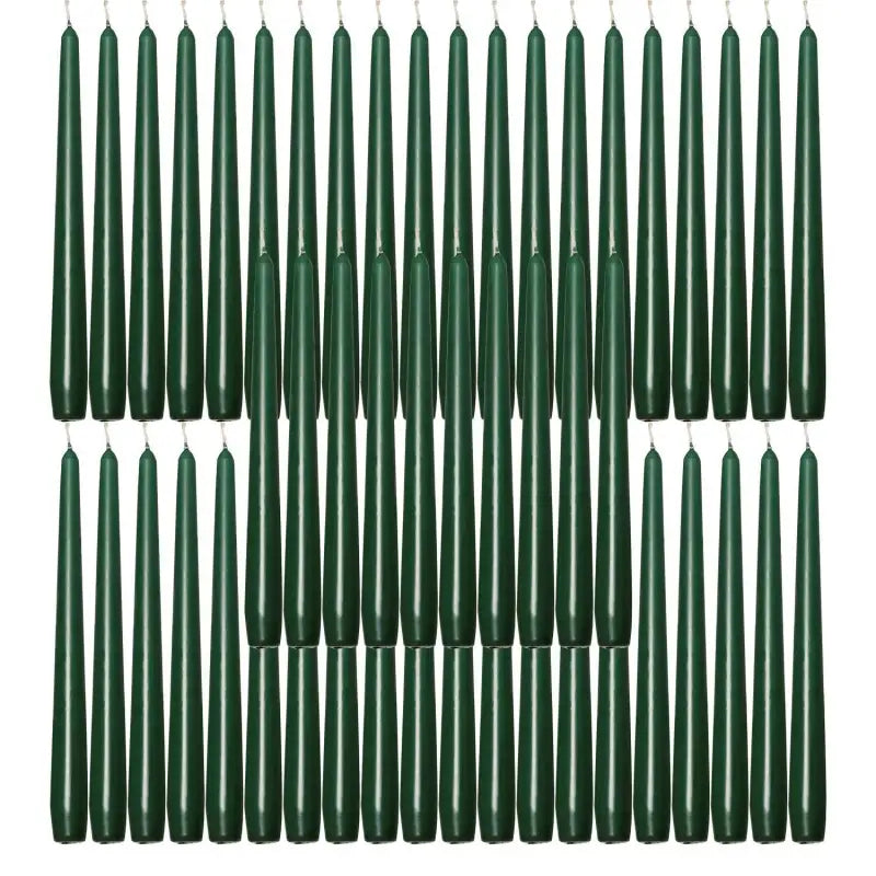 Dark green taper candles in rows for elegant dinner table decor