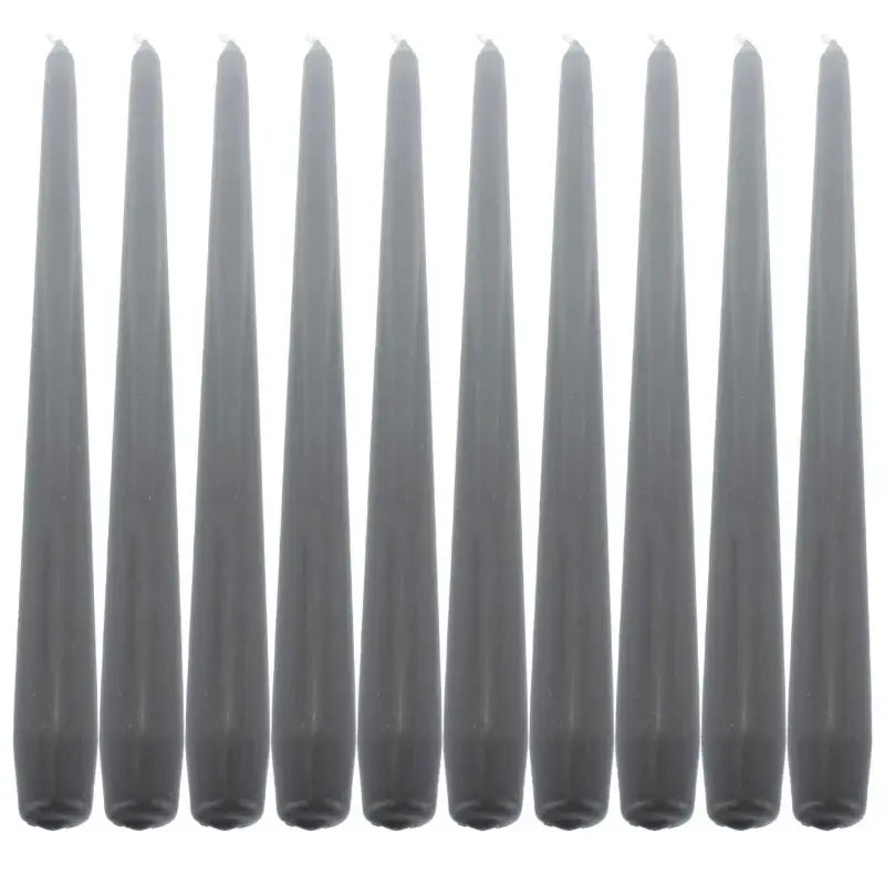 Row of tall gray taper candles for elegant dinner settings and ambiance