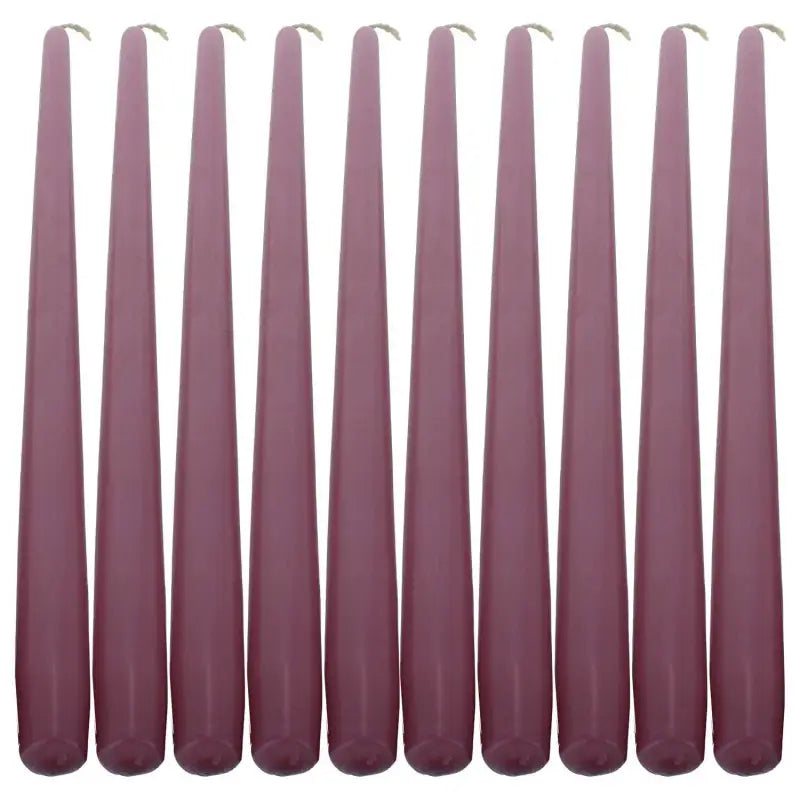 Mauve taper dinner candles in a row for elegant dining and ambiance enhancement