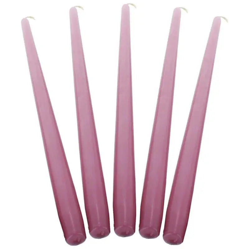 Five tapered pink candles arranged in a row, perfect taper dinner candles for any occasion