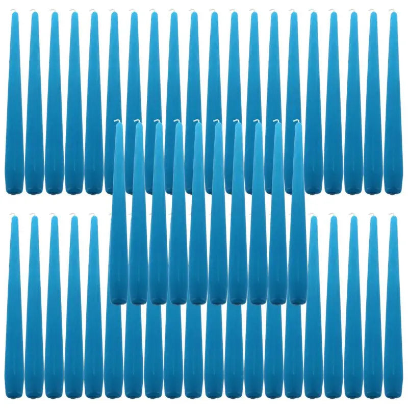 Blue plastic clothespins arranged in rows beside 9-inch taper dinner candles