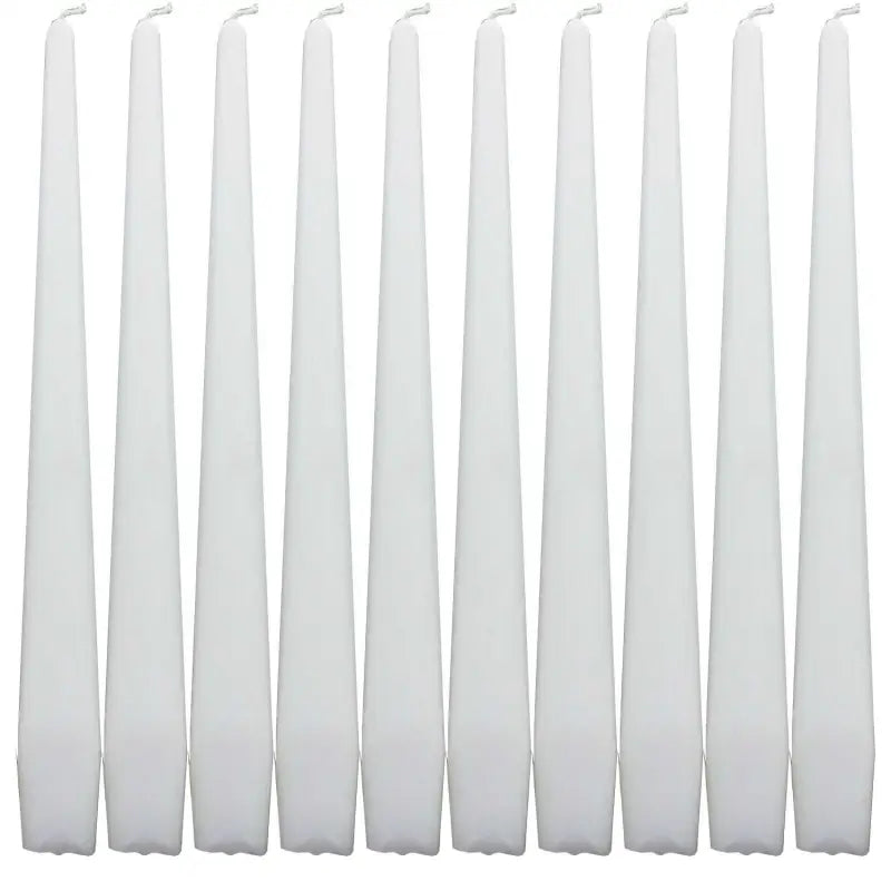 Set of white taper dinner candles arranged in a row for elegant dining decor