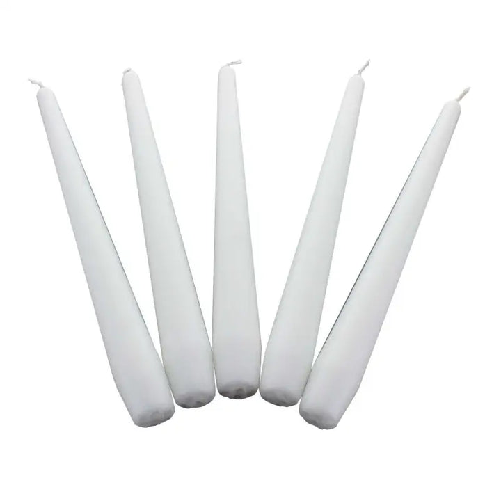 Five white taper candles in a fan pattern for elegant dinner settings