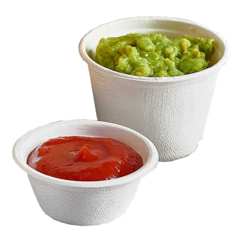 Two biodegradable sugar cane bagasse portion pots with guacamole and salsa