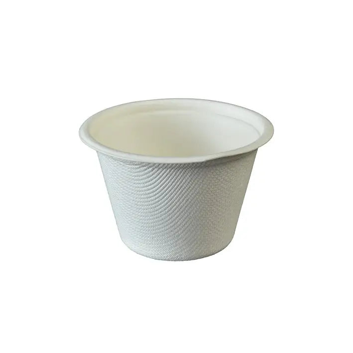 Biodegradable sugar cane cup with textured surface for eco-friendly portion serving