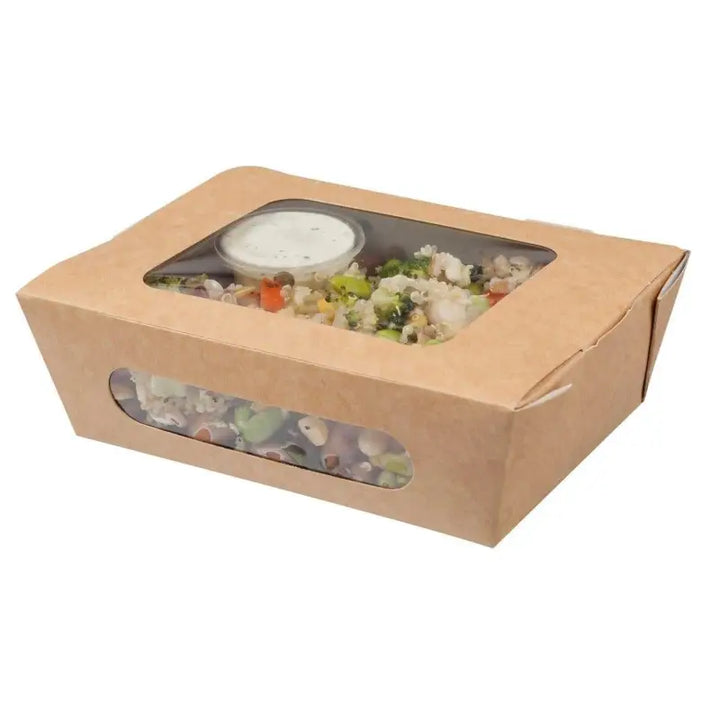 Cardboard salad box with a clear window showcasing fresh salad and dressing inside