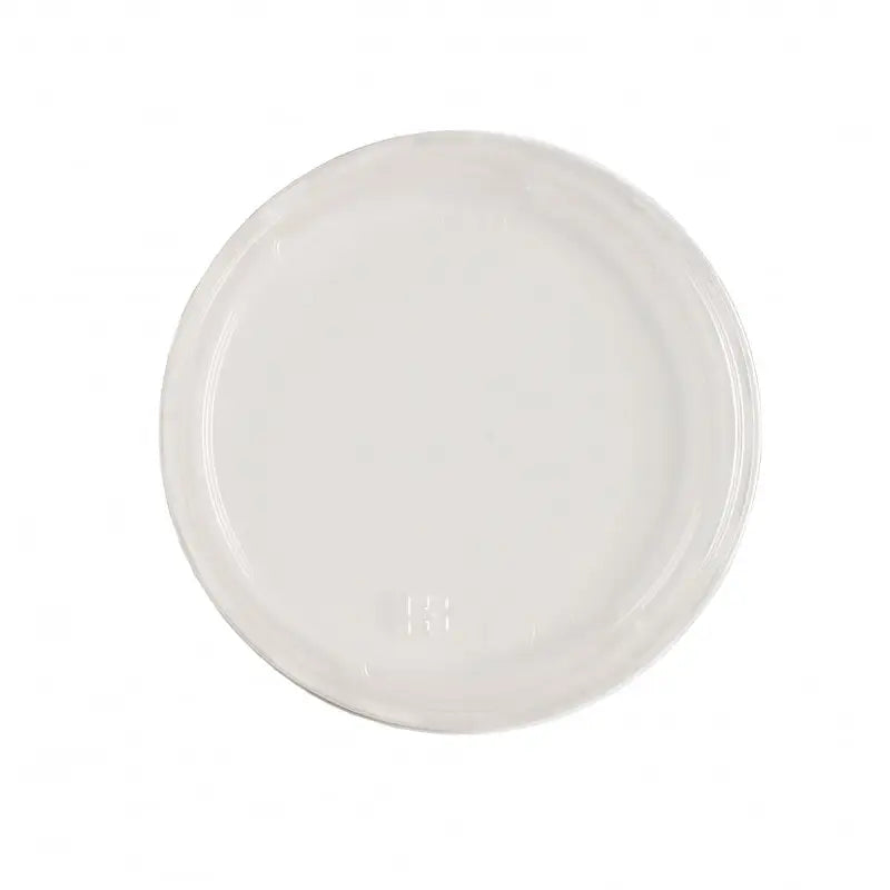 White ceramic dinner plate featuring a simple round design for microwaveable deli gourmet containers