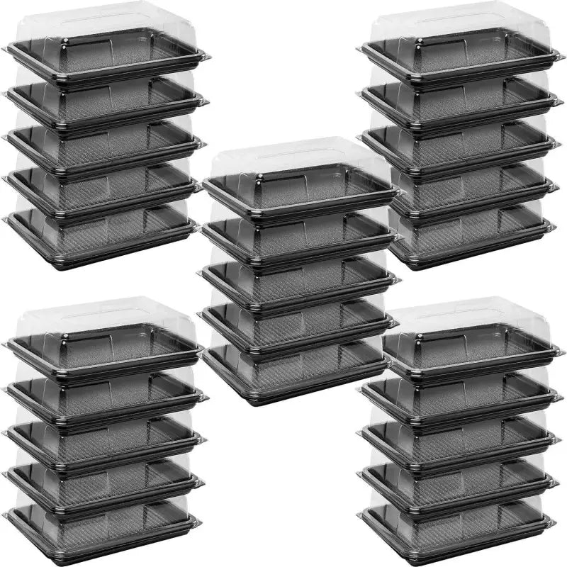 Stacks of black plastic trays with clear lids for Premium Mini Sandwich Platter Base