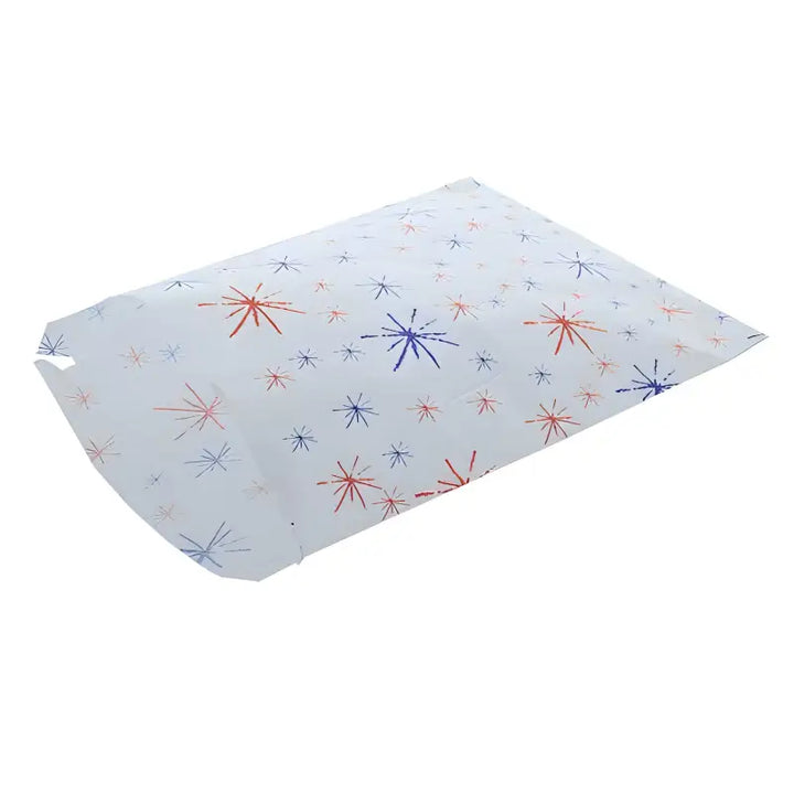 Rectangular paper placemat with red and blue starburst patterns for Starburst Printed Sulphite Paper Bags