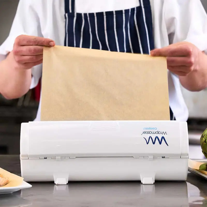 Vacuum sealer machine inserting baking parchment bag compatible with Wrapmaster Compact Baking